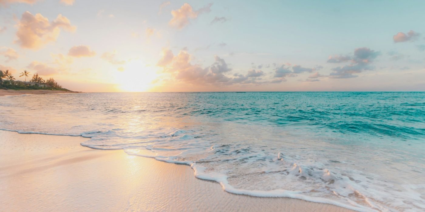 a beautiful beach at sunrise